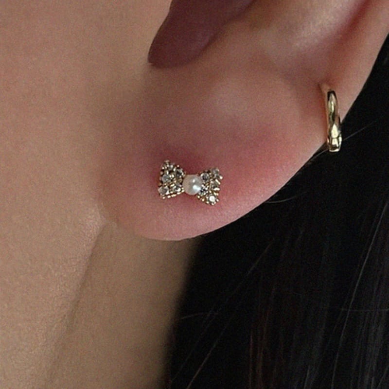 

MARQUEMENT 14k Rovie ribbon piercing rose gold