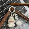 Three-dimensional Flocking Keychain Soft Glue Cute Baby Walking Bag Mobile Phone Pendant Cute Pendant