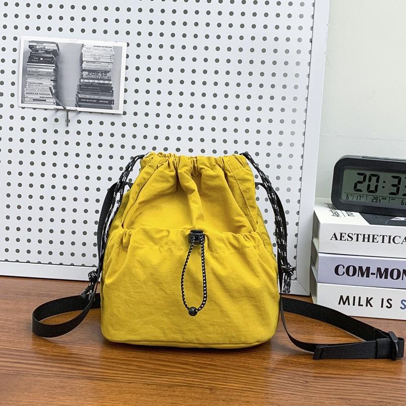 Simple trendy brand small satchel women's lightweight nylon mobile phone bag lazy pleated drawstring messenger bag men's shoulder bag