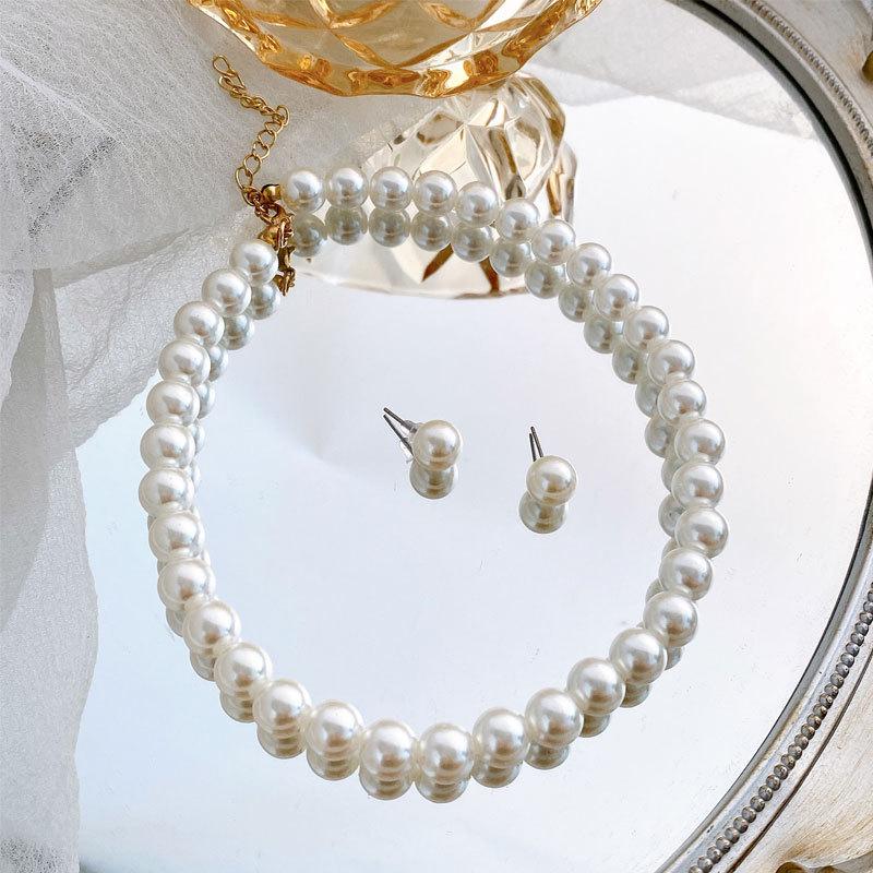 

Винтажный набор жемчужное ожерелье и серьги-пусеты для женщин - Простой стиль Хепберн, универсальный ювелирный дуэт.