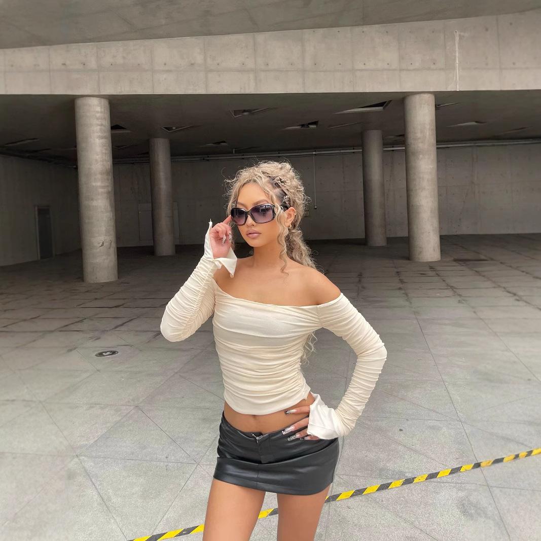 

European and American summer new women s clothing French one-word shoulder horn long-sleeved T-shirt pleated slim temperament short top women L абрикосовий