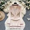 Xiaoxiangfeng advanced sense contrasting color bow strap long-sleeved dress women's metal buckle waist thin knitted skirt