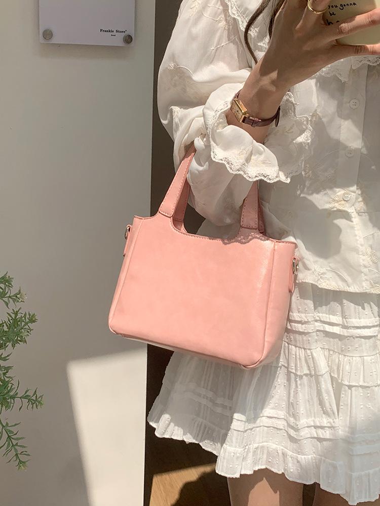 Summer fresh and simple bucket bag for women 2025 new solid color commuting shoulder bag, hand-held vegetable basket crossbody b