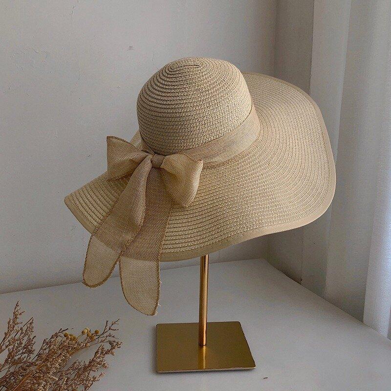 Cappello di paglia a tesa larga da donna estate protezione solare cappello a tesa larga da mare cappello da spiaggia con fiocco cappello da sole