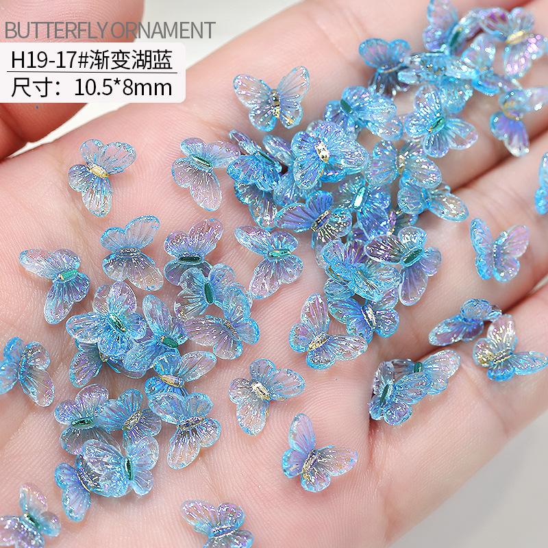 20 stuks vlinder nagelkunst accessoires - nageldecoraties met iriserende en driedimensionale vlinders gemaakt van hars voor nagelkunst.