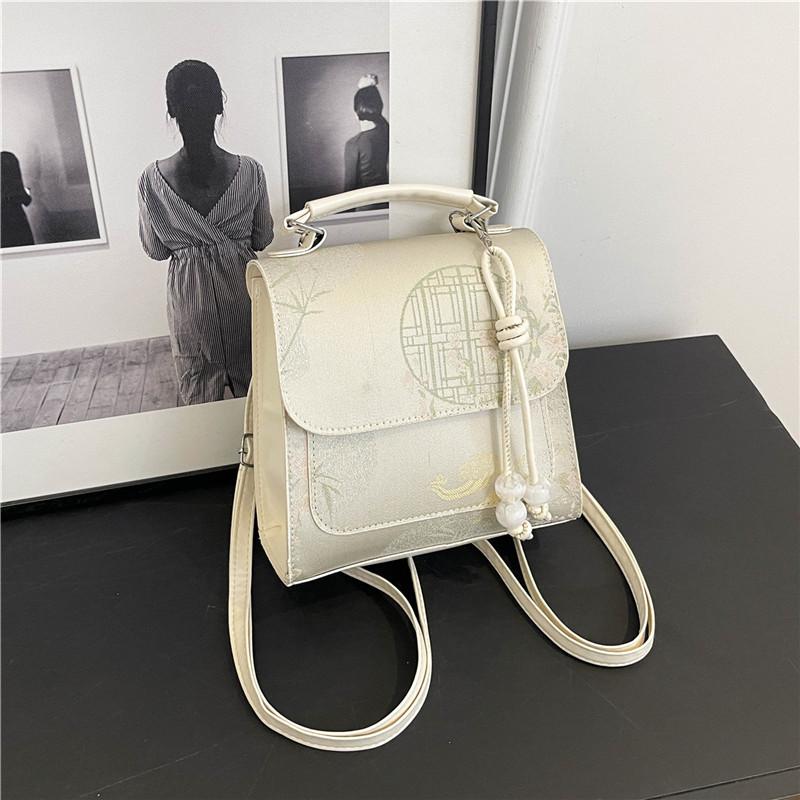 

Новый рюкзак в китайском стиле для женщин 2024 года, летняя новая модная нишевая сумка в иностранном стиле, небольшой рюкзак для путешествий серебряный