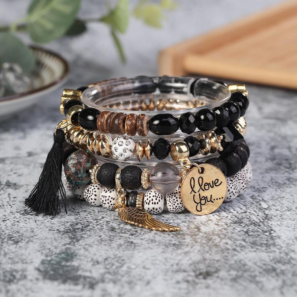 Bohemian Trendy Bracelet with Wings, 'I Love You' Tassel Pendant, and Retro Creative Design
