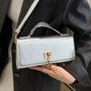 Bolsa de mão de cor sólida tendência 2025, design de nicho, versátil, grande capacidade, bolsa de ombro transversal, com fecho, bolsa feminina de temperamento