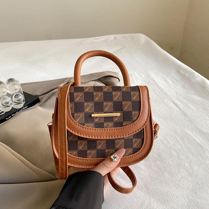 

Niche design fashion handbag new saddle bag crossbody small bag women s shoulder diagonal straddle bag