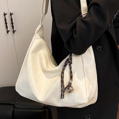 Eine große Umhängetasche mit einem hochwertigen Retro-Design, eine einseitige Achseltasche für den Weg zur Arbeit