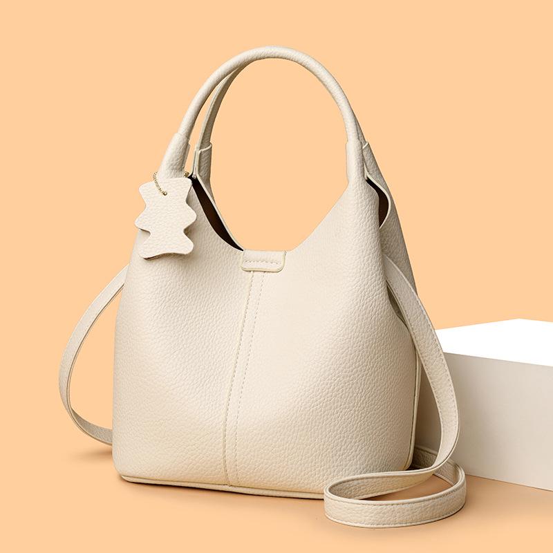 2025 High-End Genuine Leather Women's Shopping Basket Bag with Double-Sided Texture and Leather Tag.
