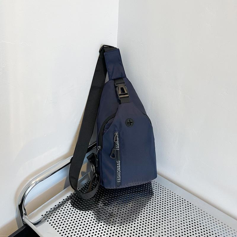 

Нагрудна сумка унісекс Проста сумка для зберігання Легкий туристичний невеликий рюкзак Сумка через плече Модні повсякденні одинарні сумки темно-синього кольору