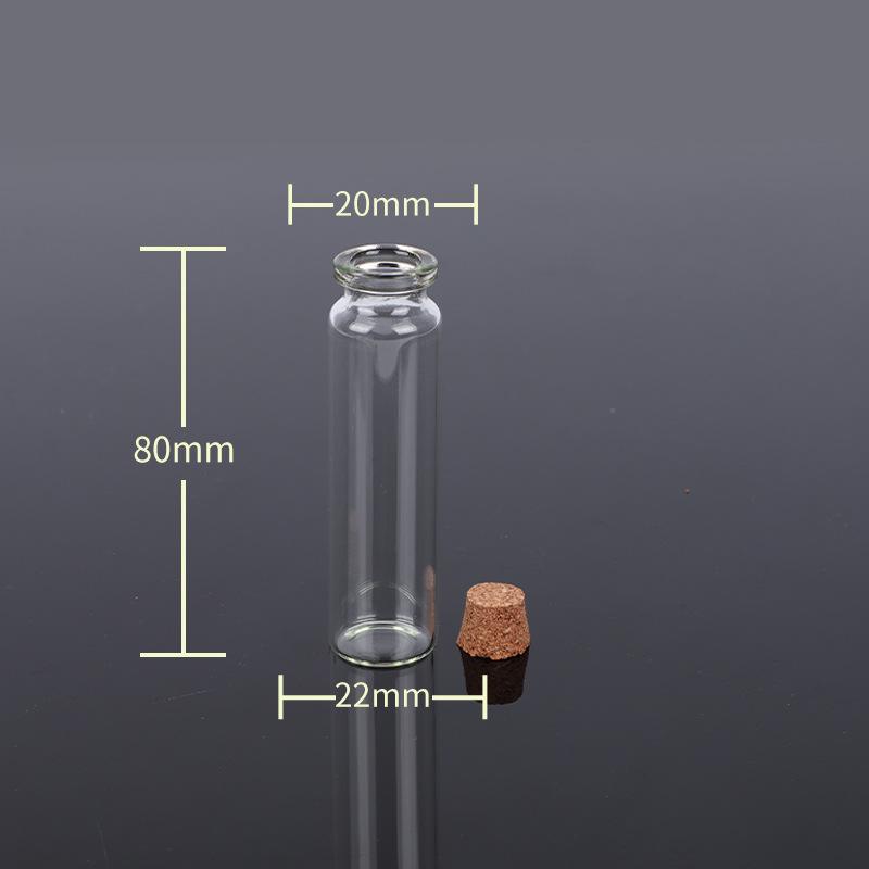 Kleine durchsichtige Glasflasche mit Korken