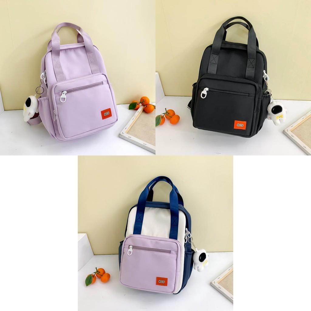 Unisex Primary School Student Backpack Waterproof Handbag With Colorful Patchwork Design