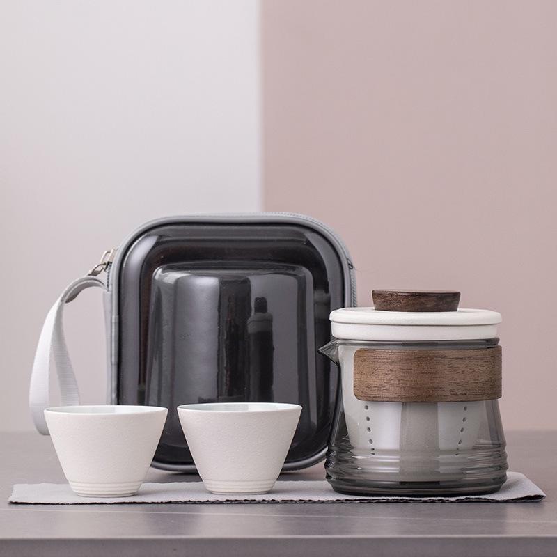 

Compact Travel Gaiwan Set: Ceramic Tea Pot & 4 Cups for Outdoor Brewing