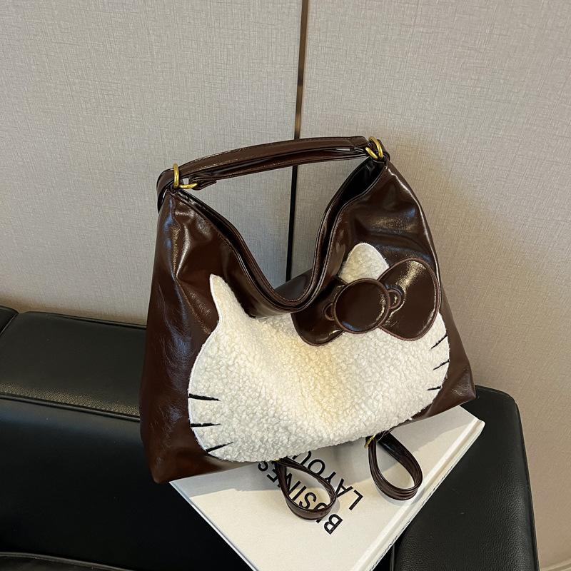 This Year's Big-faced Cat Backpack Female New Student Tote Bag Large-capacity Casual Backpack