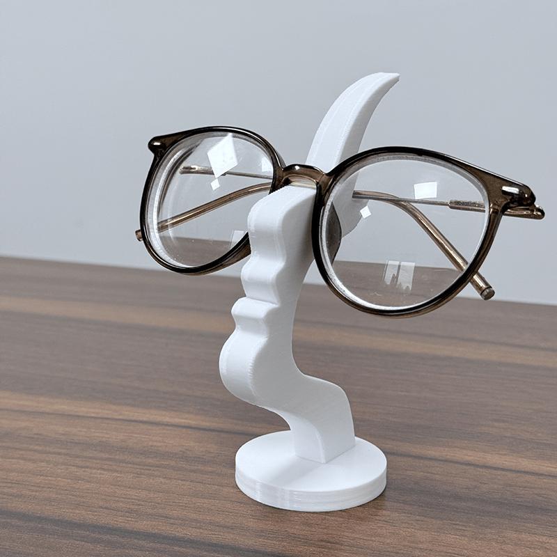 Creative side-face shaped eyeglass stand, unique curved eyeglass frame stand, desktop storage rack