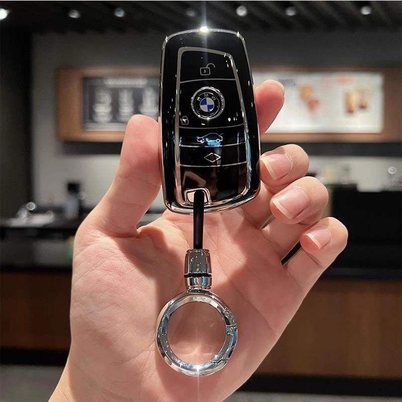 

BMW Car Key Cover for 1, 3, 5, 7 Series and X1-X6, compatible with 320Li, 530Li models. Stylish shell bag for your car keys.