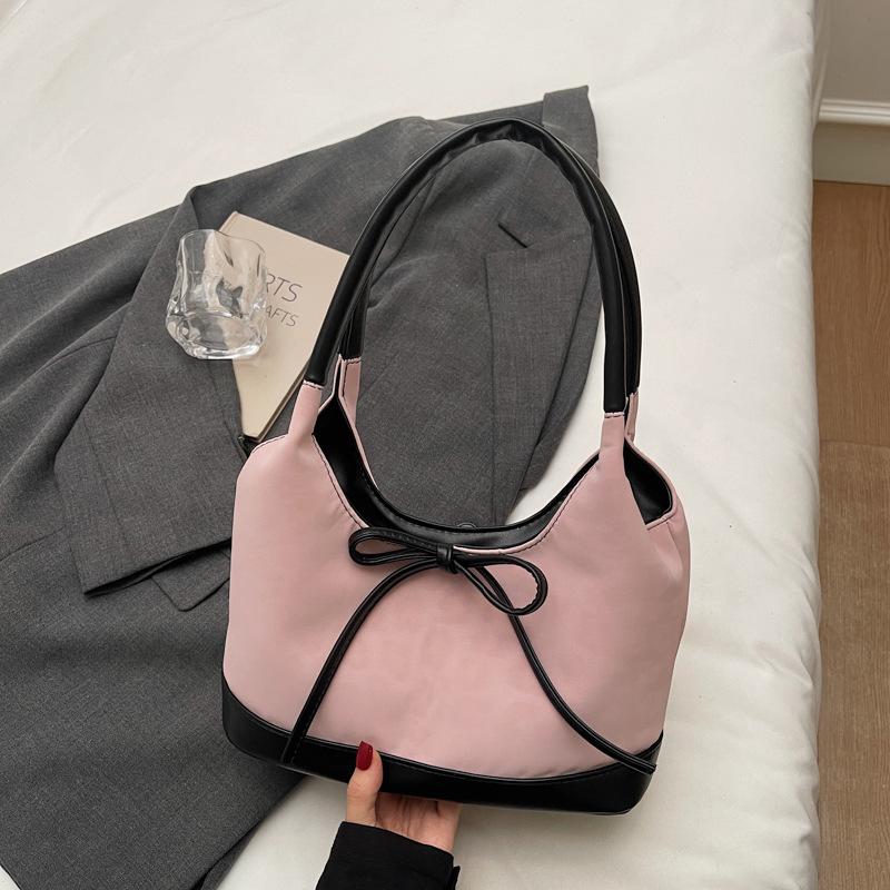 Korean version of niche foreign style portable bucket bag women's 2025 autumn new high-value suede bow shoulder bag