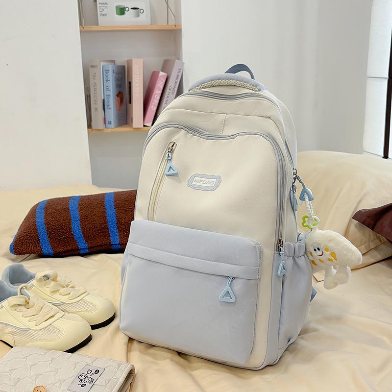 2025 summer new large-capacity literary and versatile high-value schoolbag female junior high school students simple and lightweight backpack