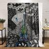 Intricate black-and-white doodles form abstract patterns around the Eiffel Tower. for all seasons blanket lunch break throw gift