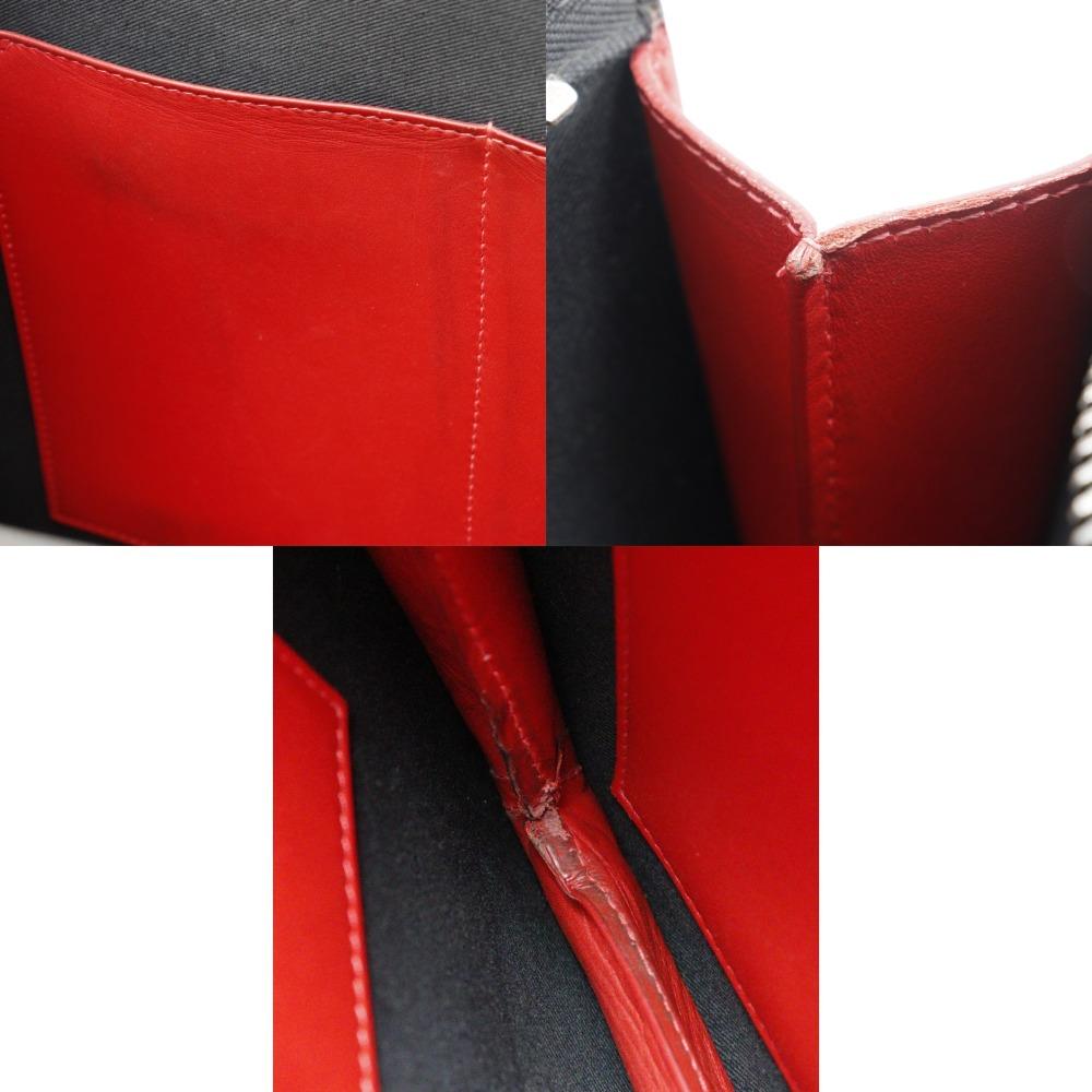 Christian Louboutin Trick Track Handtasche 2-Wege Clutch Nieten schwarz Kalbsleder Herren Gebraucht