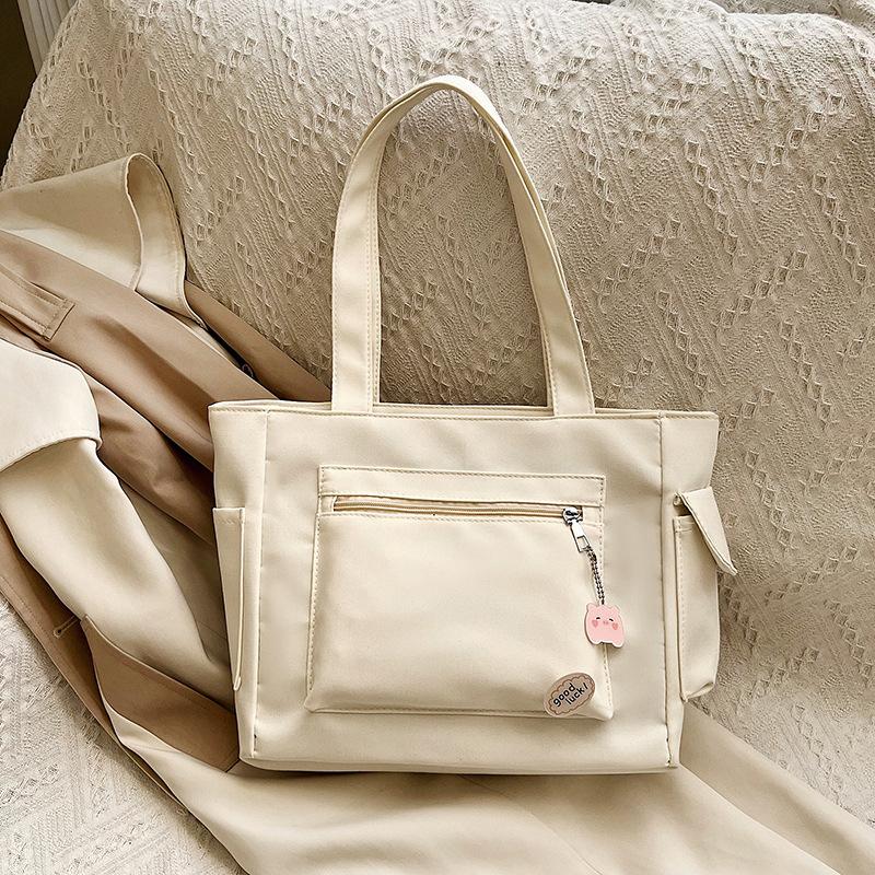 Lazy wind solid color canvas bag small fresh student bag commuter large capacity portable shoulder tote bag women