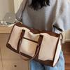 Large capacity contrasting canvas handbag women's bag 2025 new commuter travel bag simple casual shoulder crossbody bag