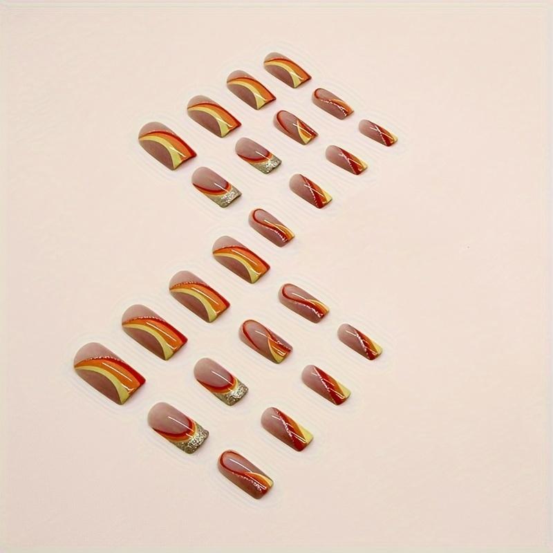 24 Stücke mittellange, französisch inspirierte, glitzernde Nagelkunst mit roten, gelben und orangefarbenen Streifen – perfekt für einen festlichen Look!