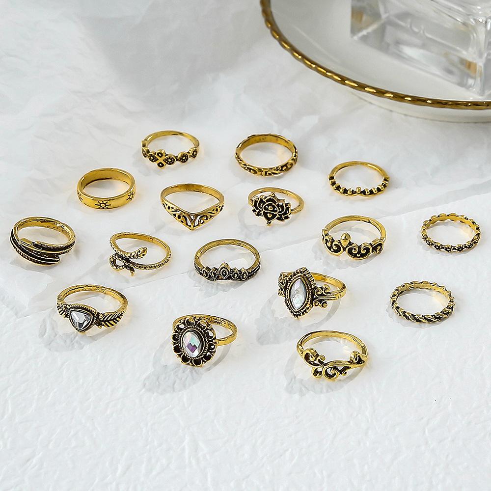 Europe and The United States New Ring Retro Exaggerated Hollow Carved Snake-shaped Feather Gem 16-piece Combination Ring Foreign Trade
