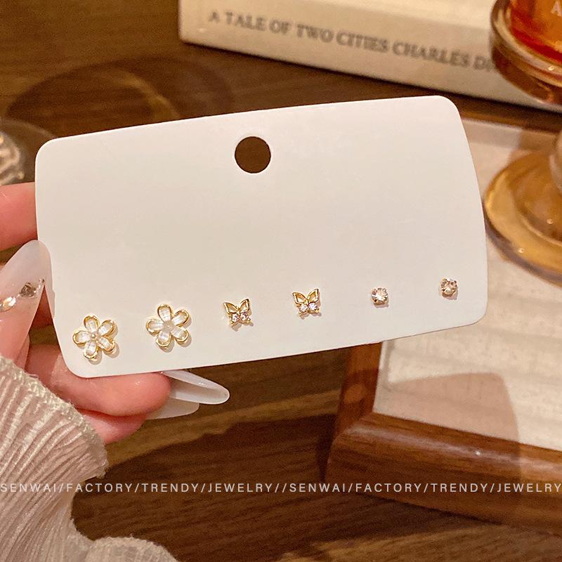 Three pairs of zircon butterfly flower stud earrings women s sweet set earrings design sense personalized ears