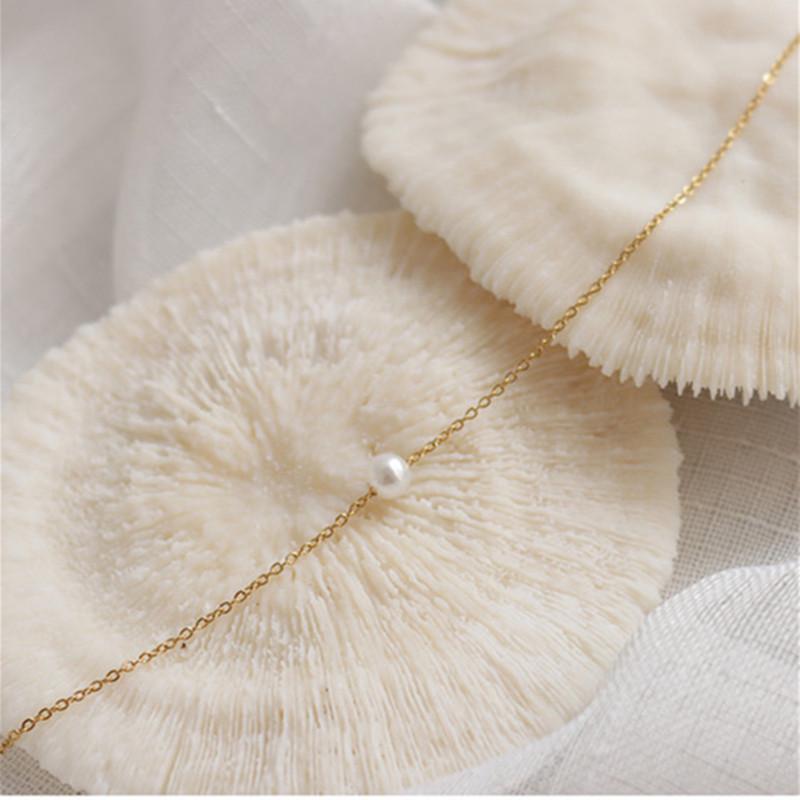 European & American Pearl Pendant Gold Necklace: Women's Simple Luck Beads Stainless Steel Clavicle Chain