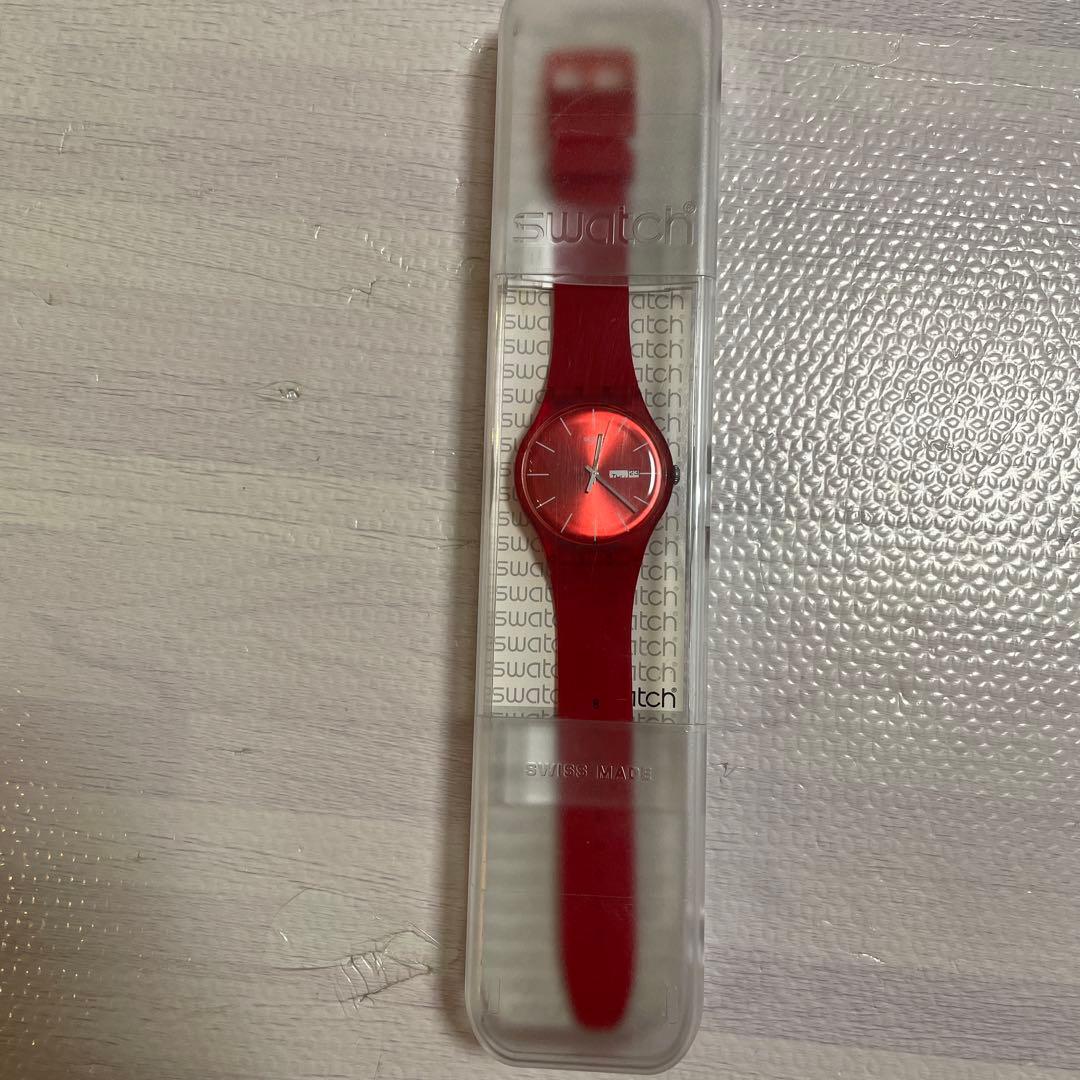 Used Swatch watch red body