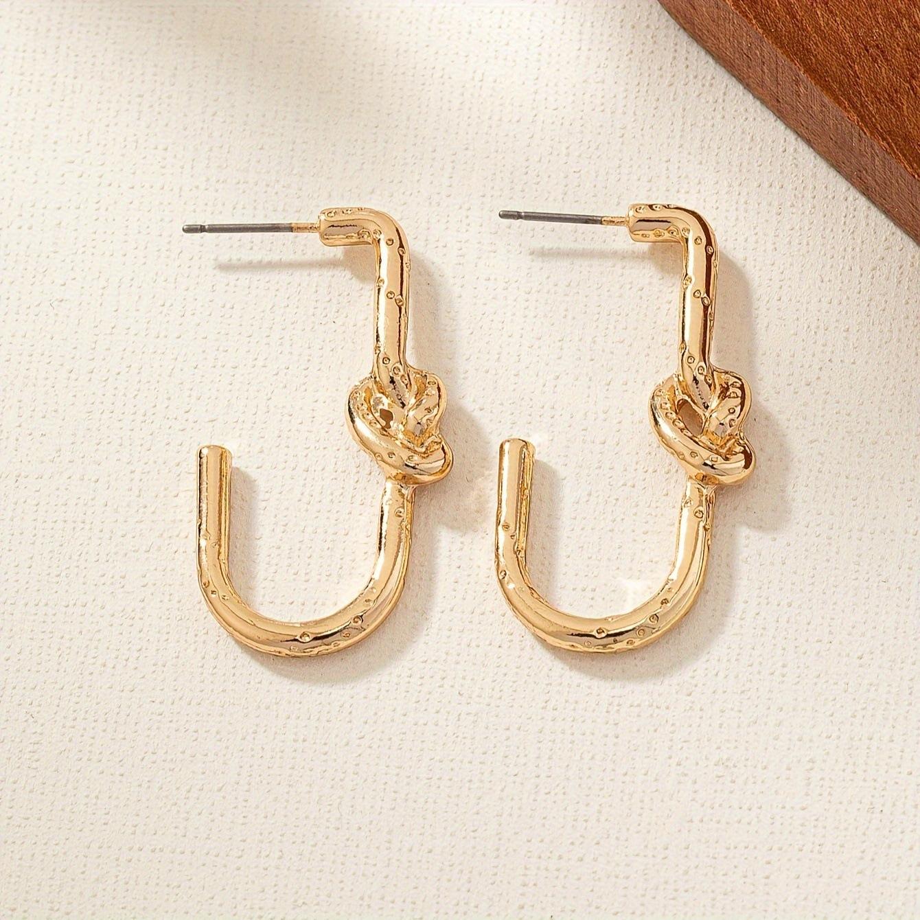Simple c-twist earrings, earrings, niche design, high-end earrings.
