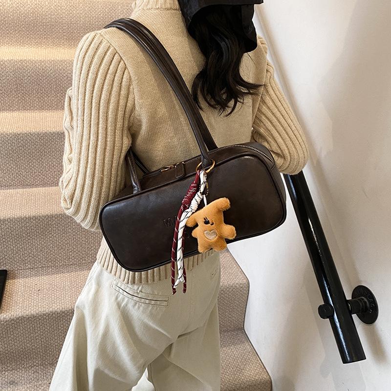 Autumn and Winter Retro Large-capacity Briefcase Women's 2025 New Super Hot Fashion Commuter Portable Bowling Bag