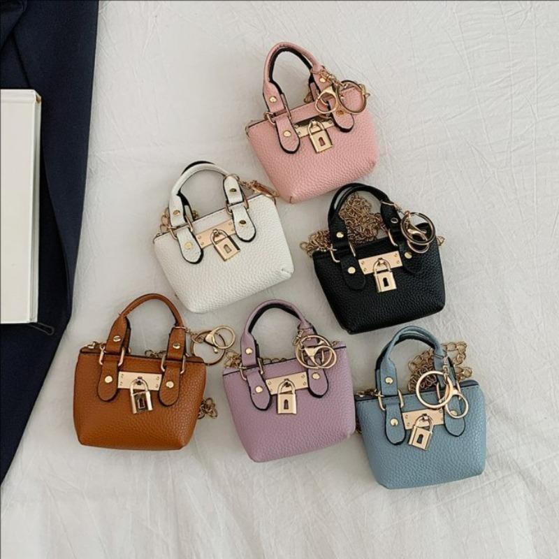 Korean version of girls' crossbody portable small square bag summer new personalized classic children's hand carry one shoulder crossbody bag