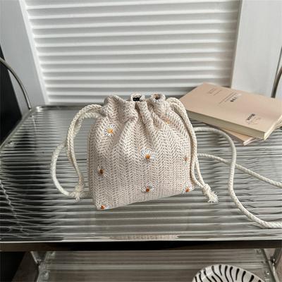 One Elegant And Portable Drawstring Bucket Bag for Women - a Versatile Crossbody Handbag Featuring a Solid Color with Floral Embroidery