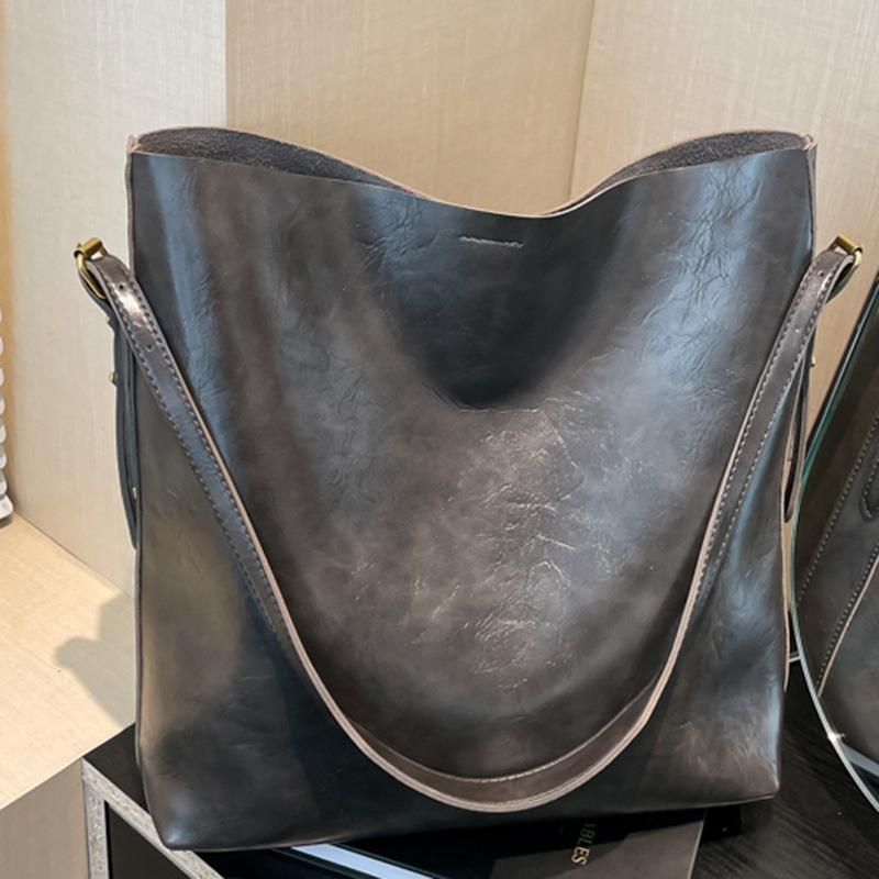 Large-capacity commuter bag women's autumn new fashion retro tote bag autumn and winter broadband armpit bag