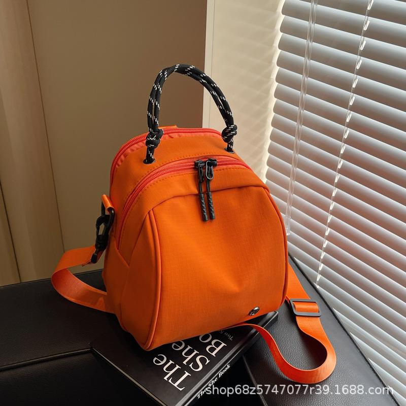 Fashion sense small backpack women's lightweight casual shoulder bag new fashion commuter shell bag simple commuter messenger bag