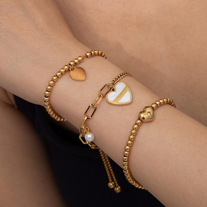 Women's Titanium Steel Heart Chain Bracelet with Beads - Luxurious Light Pull-Out Design