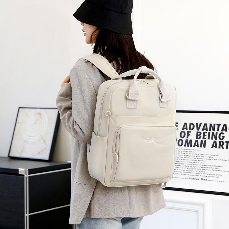 

New women s backpack anti-splashing nylon backpack portable versatile travel schoolbag
