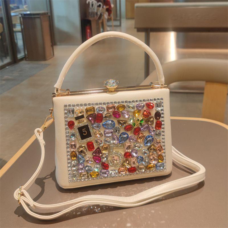 Light Luxury New Leather Fashionable Rhinestone Retro Clip Niche Handbag