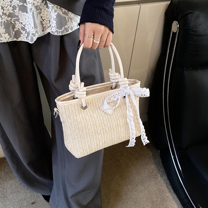Straw bag women's 2025 new high-end texture niche seaside season versatile messenger bag fashionable portable woven bag