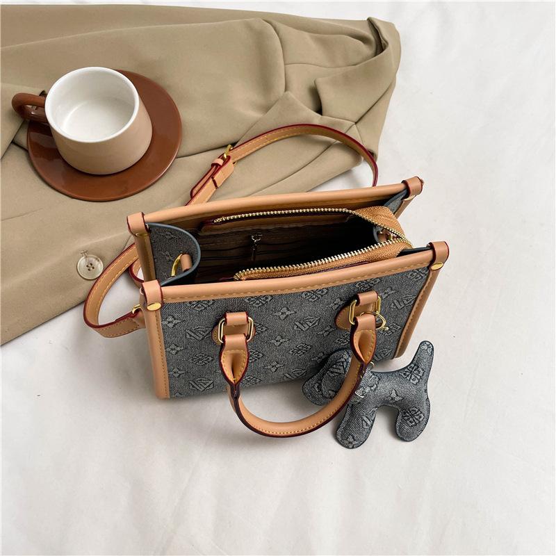 New high-end fashion contrasting color commuter bag portable shoulder oblique span women's bag