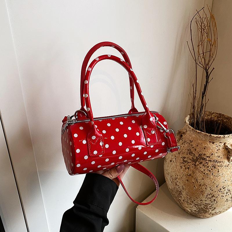 Niche design bag women's 2025 new summer shoulder messenger bag polka dot portable cylinder bag