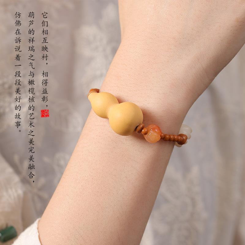 Kürbis Glücksarmband mit Olivenkern-Perlen, Neues chinesisches Stil Weiches Fingerwickelarmband, Traditionelles chinesisches Kunsthandwerk, Trendiges Design