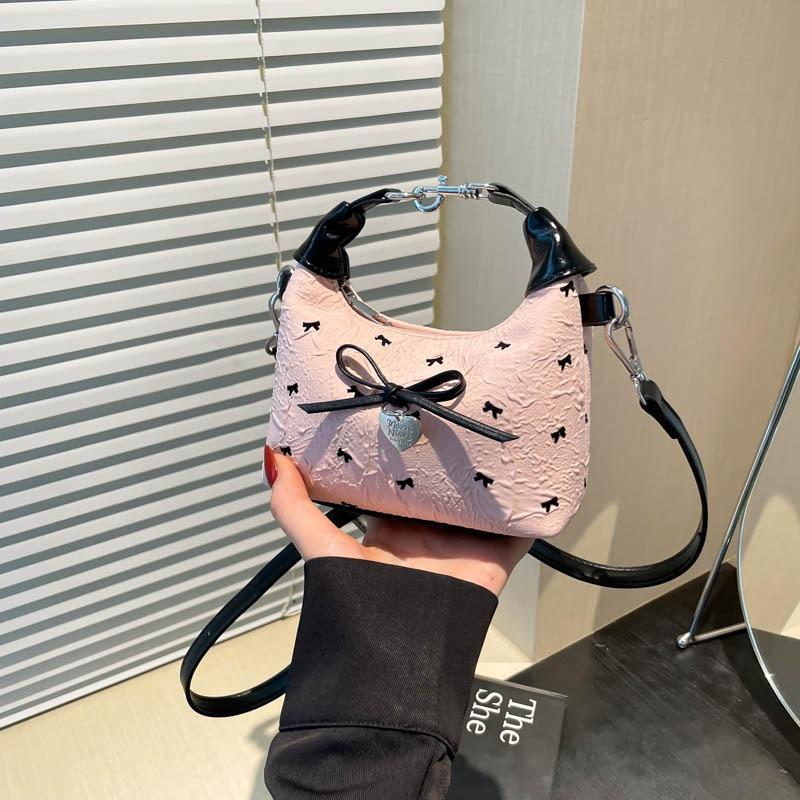 

Trendy bow bag, armpit bag, shoulder bag, cute versatile, simple and fashionable niche shoulder dumpling bag. рожевий