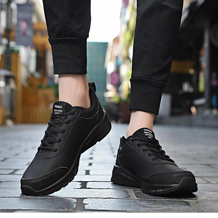 Quanzhou autumn leather sneakers waterproof and non-slip running shoes black soft-soled casual shoes