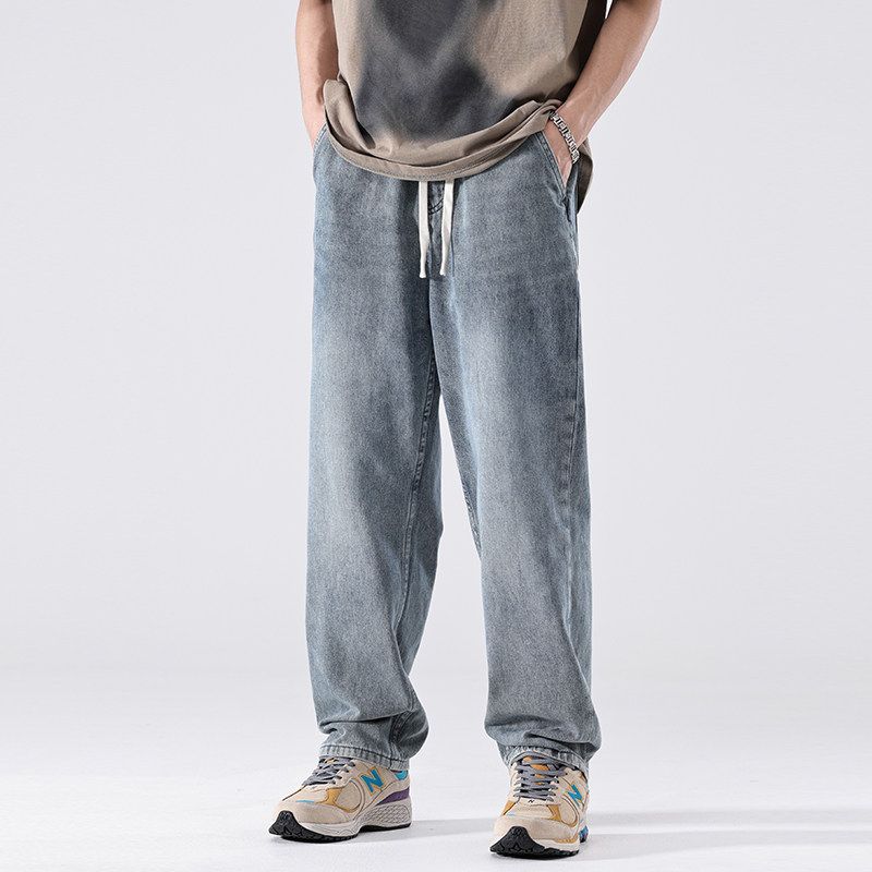 New Summer Trendy American High Street Style Men s Denim Pants with Elastic Waist, Loose Straight Fit, and Drapey Wide-Leg Design Blue 28