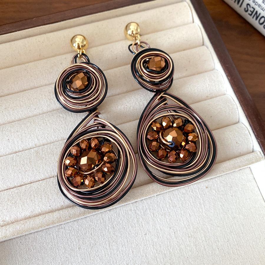

Steel needle European and American exaggerated glass weaving round earrings women s retro personalized earrings niche high-end earrings
